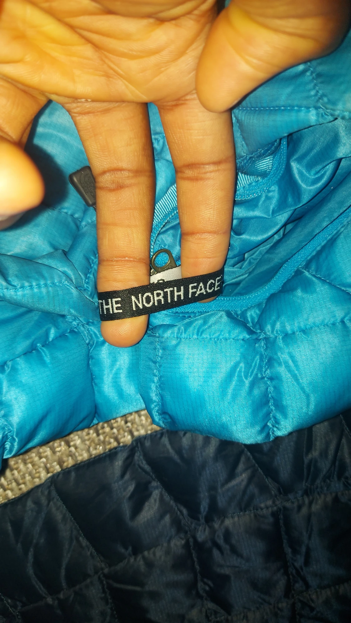 Blå och svart dunjacka från The North Face - 5