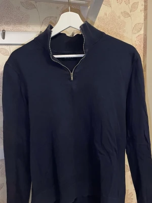 Zip-tröja - Zip-tröja i bomull (obs. inte ull) från Riley