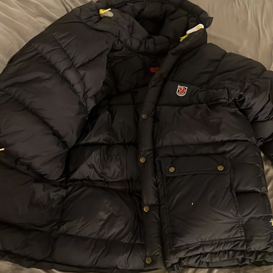 Svart pufferjacka från Fjällräven