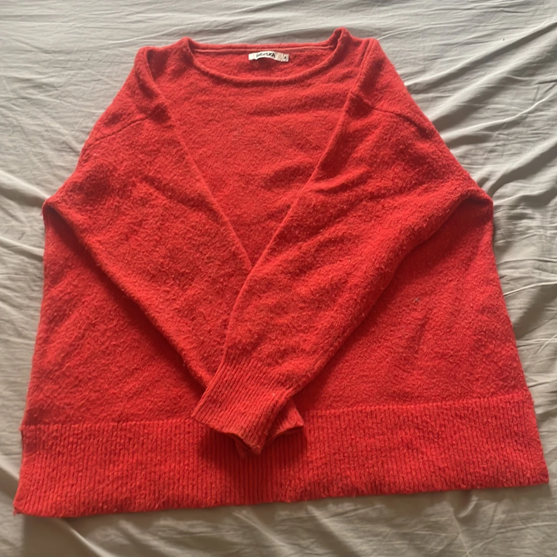 Orange Ull stickad tröja från Indiska