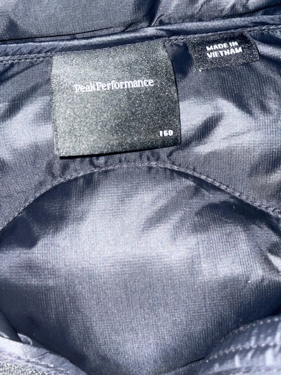 Svart dunjacka från Peak Performance - 1