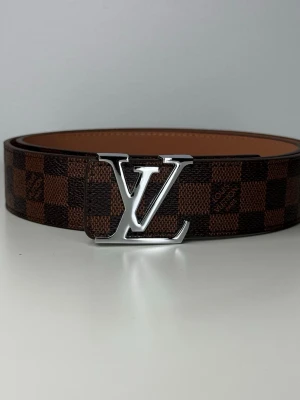 Bälte - Bälte i storlek 120cm som kommer med en Bältetång