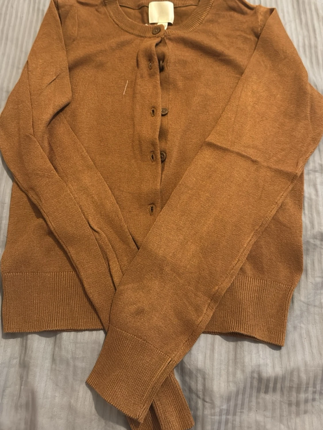 Brun kofta från H&M med knappar