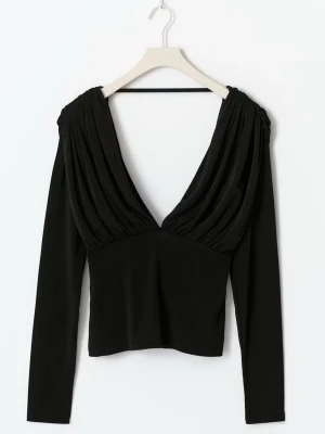 Blus utan rygg - Säljer en jättefin fest topp med öppen rygg! Riktigt snygg på middag eller fest! Endast använd ett par gånger. Storlek S