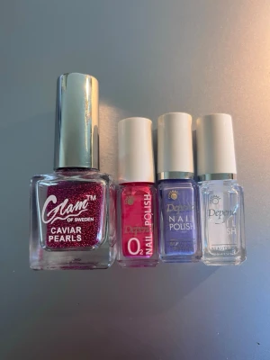 Nagellack och tillbehör - 3st nagellack från depend och caviar pearls från Glam of Sweden. Det genomskinliga nagellacket har aldrig använts. Av de andra två samt pärlorna finns mer än hälften kvar.