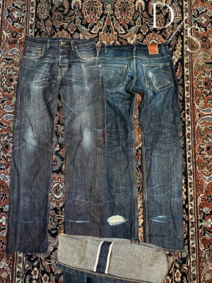 East dust Selvedge jeans - Riktigt snygga Selvedge Jeans från kvalitet märket ”East dust” dem har högt fokus på kvalitet o kostar flera tusen i nypris. Dessa jeans är väldigt långa vilket gör att när man använder dem får dem en riktigt nice stack. Midja:42cm Längd: 116cm Benöppning:19cm