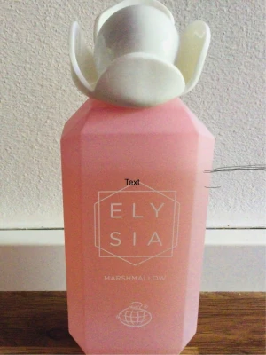 Elysia Marshmallow parfym - Elysia Marshmallow parfym från Fragrance world, se strecket på bilden hur mycket använt 