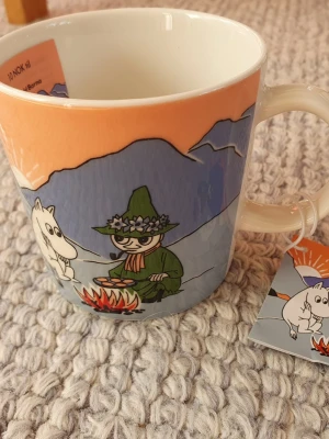 Ny Mumin Norge mugg På fjället  - Felfri mugg med etikett kvar. Aabia. Packar mycket bra. 