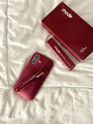 Brand New Rhode Raspberry Phone Case for iPhone 16 - Selling a brand new Rhode Raspberry phone case for iPhone 16. Never used and in perfect condition. Features the iconic lip treatment holder on the back and the beautiful Raspberry color. Stylish, protective, and perfect for any Rhode fan. ✨ Brand new 📱 Compatible with iPhone 16 💖 Color: Raspberry 📦 Ready to ship Feel free to message me if you have any questions!