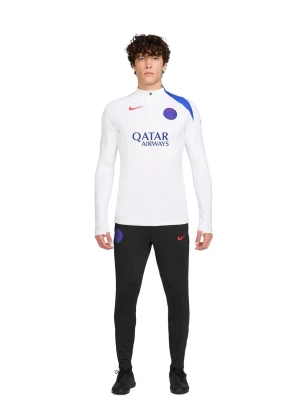 Nike Paris Saint-Germain träningsset-Helt Ny med Tags - Säljer ett helt nytt och oanvänt Nike PSG träningsset, perfekt för träning, uppvärmning eller vardagsbruk.  Setet består av: 	•	Långärmad tränings-/drilltröja i vitt med 1/4-zip 	•	Träningsbyxor i svart 	•	Officiella Paris Saint-Germain-logotyper 	•	Qatar Airways sponsortryck på tröjan 	•	Nike Swoosh-detaljer i kontrastfärg  🔹 Original Nike 🔹 Officiell PSG-kollektion 🔹 Helt nytt med originaltaggar kvar 🔹 Bekvämt, följsamt och sportigt material  