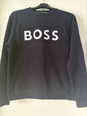 Svart hoodie från BOSS - Äkta svatt BOSS tröja