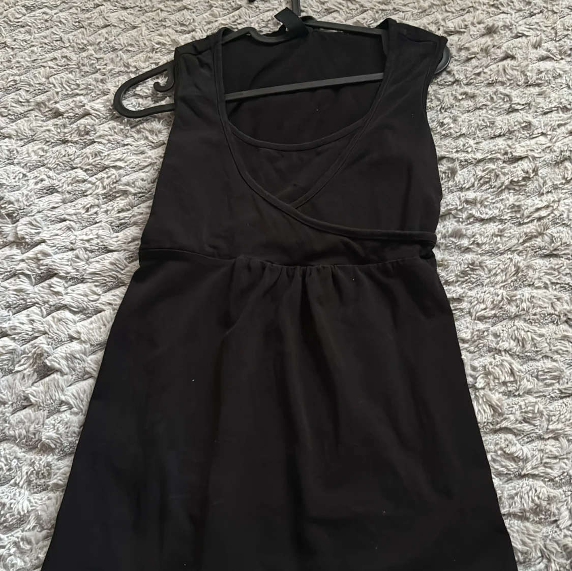 Svart omlott linnetopp - 2