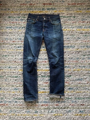 Nudie Jeans Selvedge - A pair of Selvedge Nudie Jeans in size 30/34. Great condition. Model Grim Tim Dry Slevage. Feel free to message me if you have any questions!  Measurements: Waist - 40,5 cm Length - 107 cm Leg opening - 17,5 cm