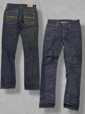 Nudie jeans Grim Tim Dry W32 L32 RARE - Säljer nu dessa riktigt feta Nudie Grim Tim i storleken W32 L32! 👖De har massor med sjuka fades kvar att ge och kommer bli snyggare och snyggare desto mer man använder dem! Hör av dug vid frågor om mått mm…