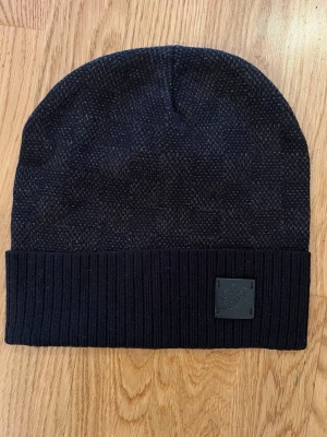 Mössa  - Helt ny oanvänd 