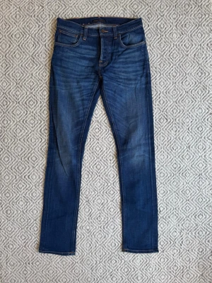 Nudie jeans - Nudie jeans - Modell: Grim Tim - Storlek: W30/L34 - skick: 9/10 - Nypris runt 2000kr Bara att höra av sig vid minsta fundering!🤩