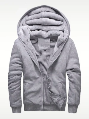 Grå hoodie med fluffigt foder - Skitskön hoodie med päls i. Den har fleece material över hela varan. 9/10 skick inga defekter. Storlek M/L. Mått: axelbredd 52cm. Längd 70cm.