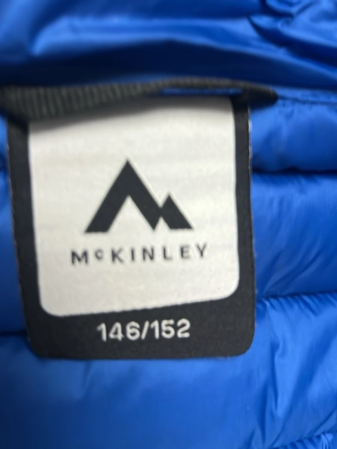 Blå dunjacka med huva från McKinley - 2