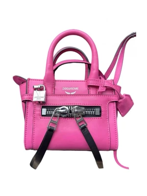 Rosa Zadig & Voltaire handväska - Cool rosa handväska från Zadig & Voltaire i läder med silverfärgade metalldetaljer, dekorativa dragkedjor och hänglås💗denna modell går inte att köpa i sverge där av priset