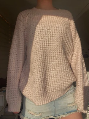 Rosa stickad tröja  - Superfin 