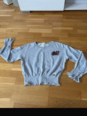 Topp Kappahl stl 158/164 - Topp från Kappahl (Rükie) i storlek 158/164. Mycket bra skick, endast använd 1 gång.