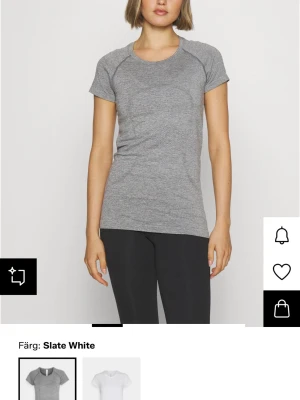 Grå tight tränings t-shirt från Lululemon  - Grå tight tränings t-shirt från Lululemon storlek 12 amerikansk. Ord pris 740kr