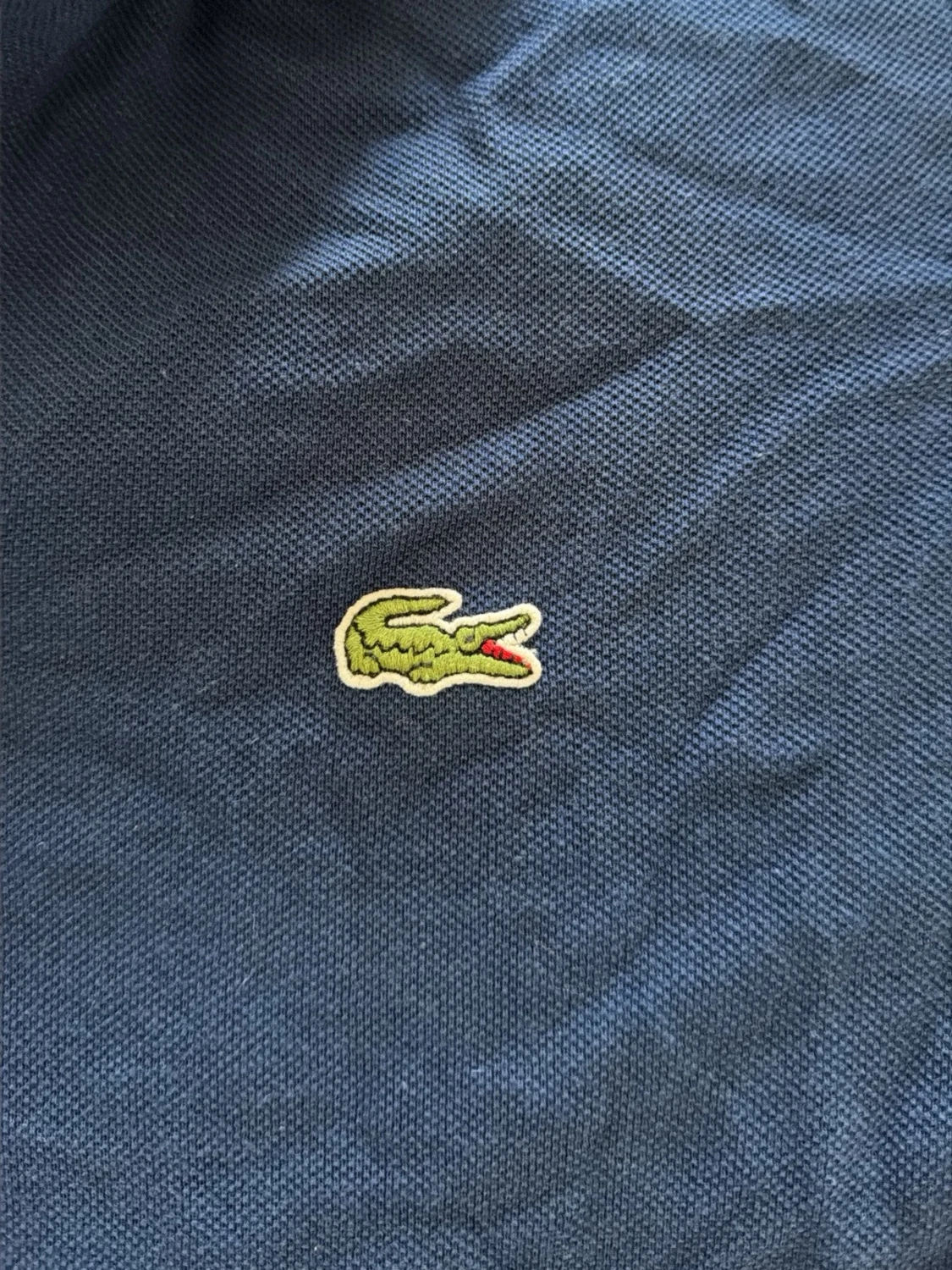 Blå pikétopp från Lacoste - 1