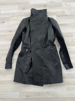 Rick Owens Leather Jacket - Super rare vintage Rick Owens long leather jacket with knitted sleeves. Amazing piece from the FW16 collection. No flaws 💘 Tagged size IT44 but fits smaller. Debating if i should keep her but open to offers. Measurements: pit to pit - 45cm / waist - 44cm  / length - 86cm