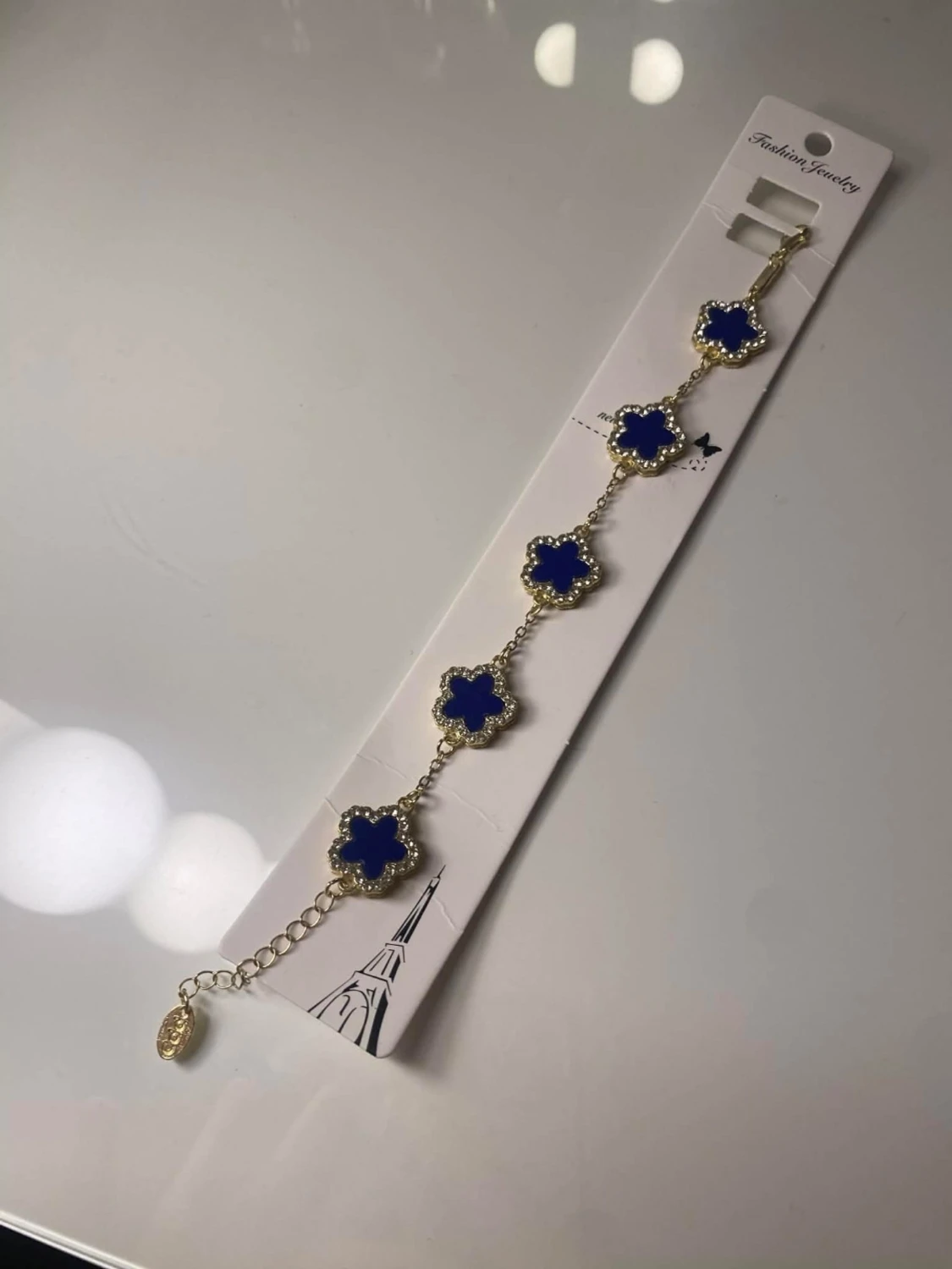 Guldarmband med blå klöverhängen 18K pläterad - 2