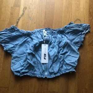 Ny topp från New Yorker stl M - Supersnygg kort topp från New Yorker. Helt Ny med tags kvar. Stl M