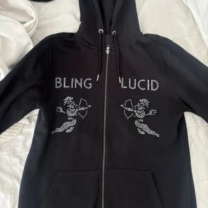 Svart Bling Lucid zipup - Nytt skick, svart zipup från Lucid bling, herr