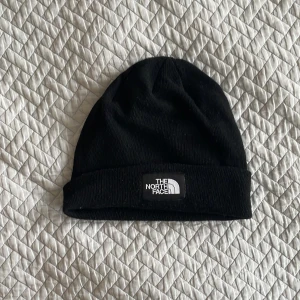 The North Face mössa - One Size, 95%polyester 5%polyamid. Oanvänd 