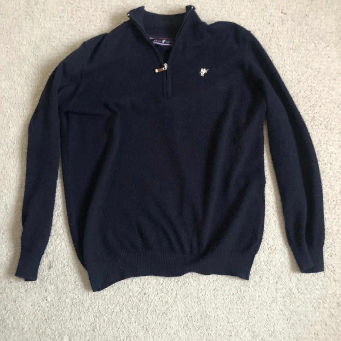 Stickad half zip