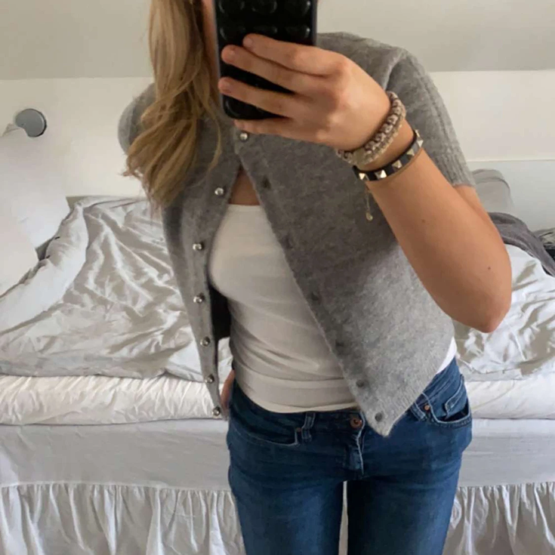 Stickad kortärmad tröja