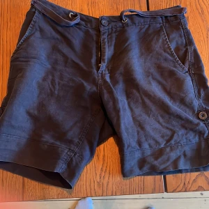 Blå linne shorts - W 30  Fint skick 