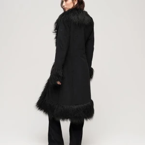 Superdry afghan coat - Penny lane coat / afghan long coat  Köptes förra vintern och har använt typ 3 ggr. Köpte för 2000 kr. 