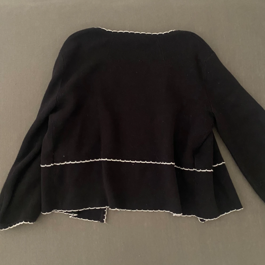 Tre kvartsärmad kofta  - 91