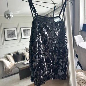 Paljettopp  - Helt oanvänd paljetttopp. Väldigt fin! 