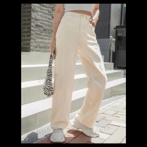 Beige High Waisted Wide Leg Jeans - Beige high waisted wide leg jeans. Never used. Too small for me. 