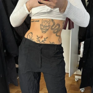 kostymbyxor  - Svarta kostymbyxor lowwaist