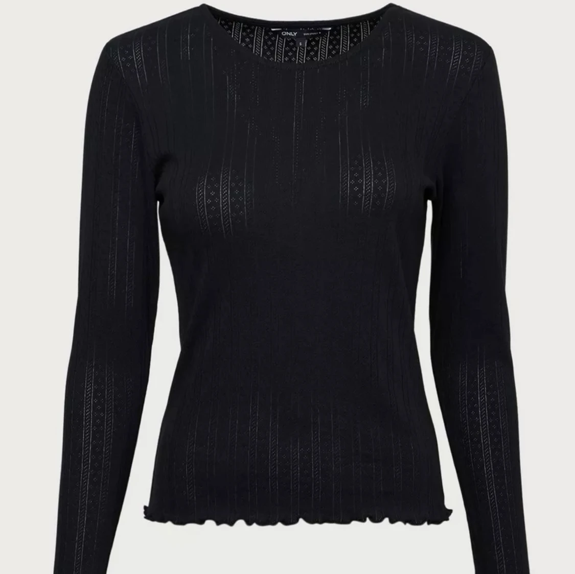 Svart mönstrad tröja