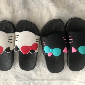 Hello Kitty Halkfria Tofflor  - Stlk kvar  Vita 31,30,26 och 25 Svart 31,28,26 och 24 125kr/par 
