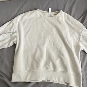 Beige/vit sweatshirt från H&M