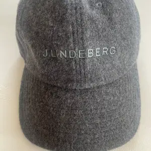 J.Lindeberg keps i grått aldrig använt