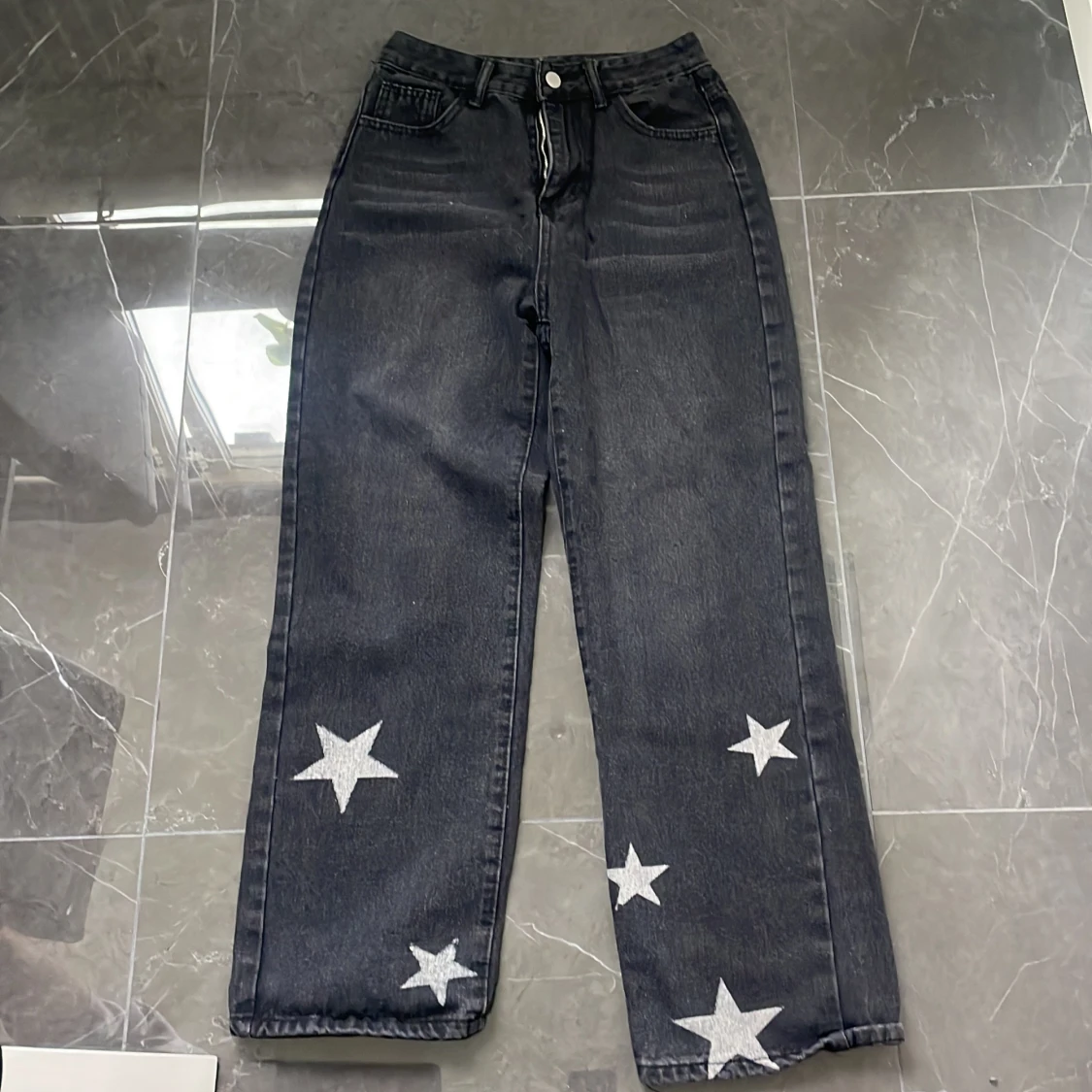 Svarta jeans med stjärnor - 91