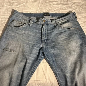 Low bootcut Lee jeans - Jättefina ljusblå lågmidjade bootcut jeans!