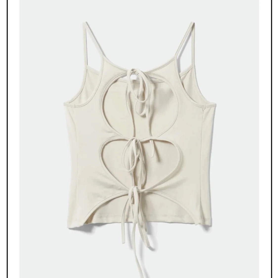 Linne med öppen rygg