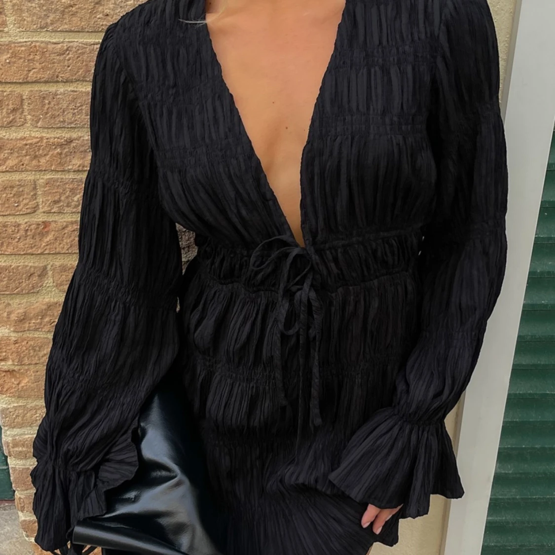 Strukturerad miniklänning 