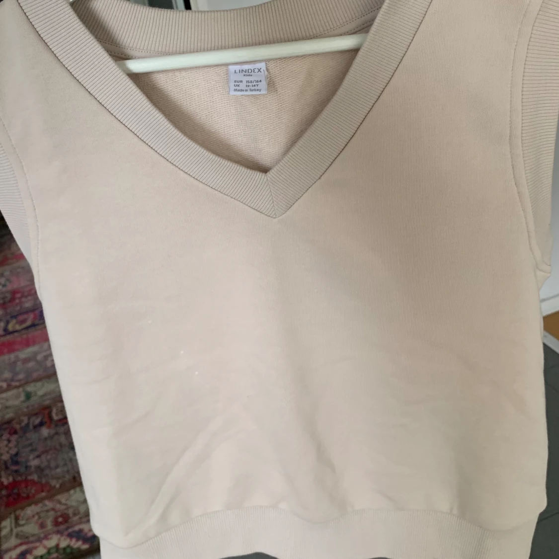 En snygg beige vest  - 91