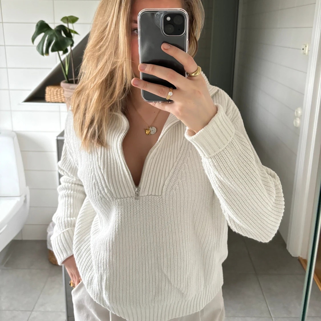 Stickad tröja med zip